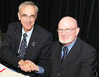 On the occasion of the 2005 Quebec-New York Summit, a Memorandum of Understanding is signed between Universit� Laval Rector Michel Pigeon and SUNY Plattsburgh Provost Robert Golden.