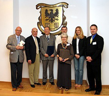 From the left, Vice Rector for International Education, Dr. Krzysztok Ojtrowski; Associate Vice Chancellor, Ambassador Robert R. Gosende; Rector, Dr. Adam Koseski; Writer, Mrs. Dava Sobel; and Program Manager, Mr. Maciej Kucharczyk after the signing ceremony.