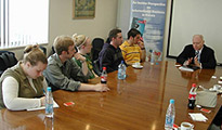 Group of students sitting with the Faculty of Foreign Languages