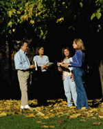 Class discussion under tree