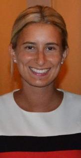 A woman smiling for a professional headshot.