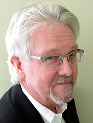 George J. Searles headshot