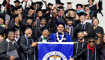 SUNY Higher Education in Prison graduates with Chancellor King.