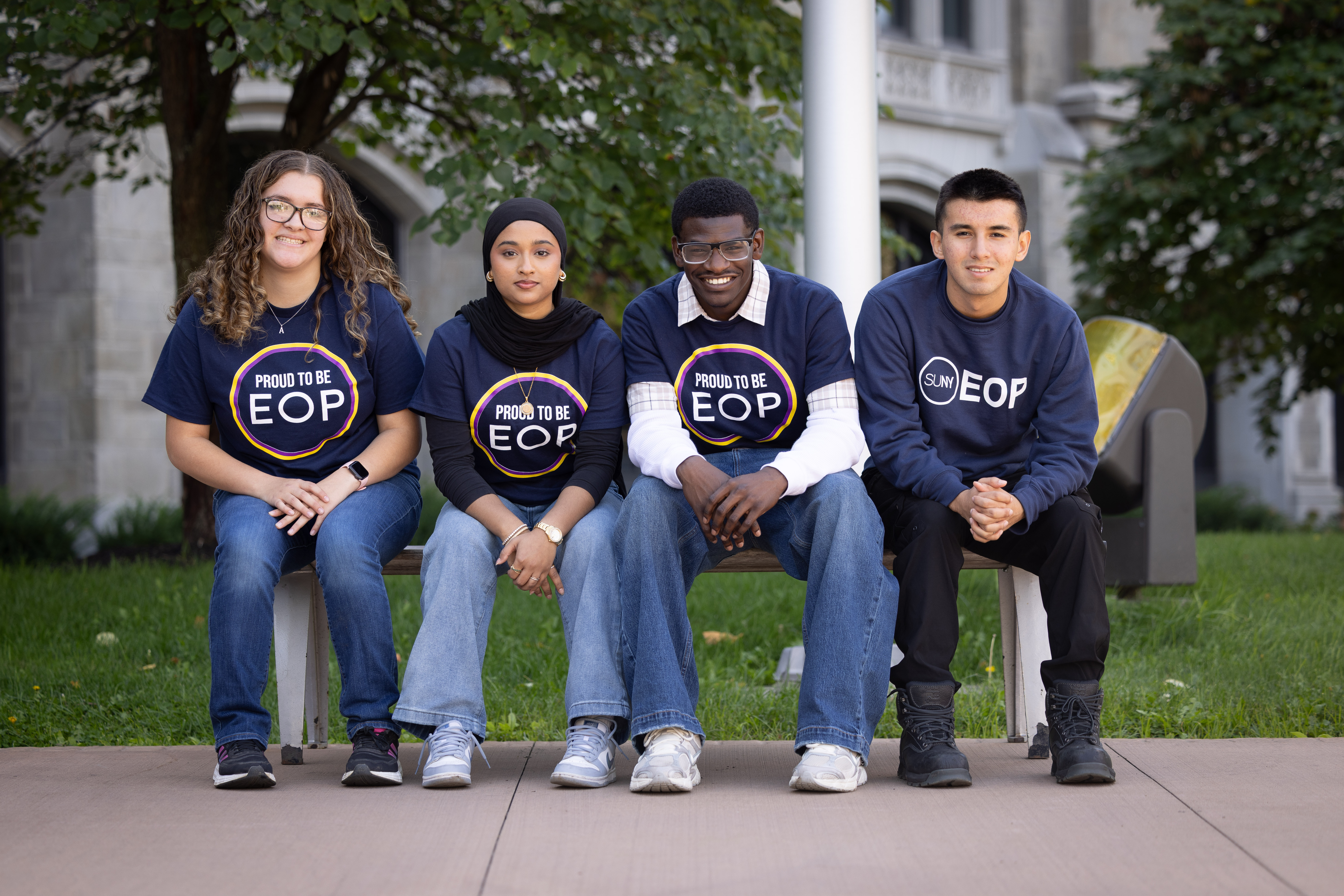 Group of EOP students sitting on bench