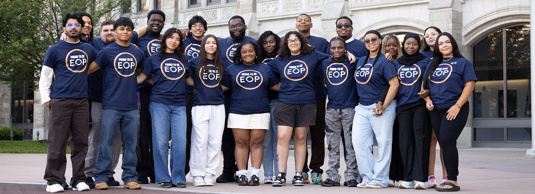 SUNY's EOP Student Ambassadors in a group photo outside the SUNY System Administration building all wearing Proud to be EOP tshirts.