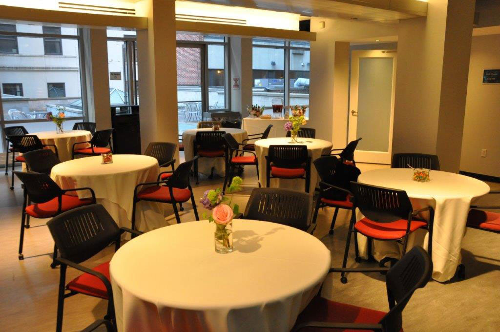 Cafe space at SUNY Global Center with tables set up for a reception.