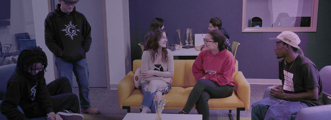 Students sit and talk in a student lounge at Columbia-Green Community College