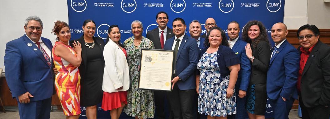 Members of the Hispanic Leadership Institute 2023 cohort pose with SUNY Chancellor John King.