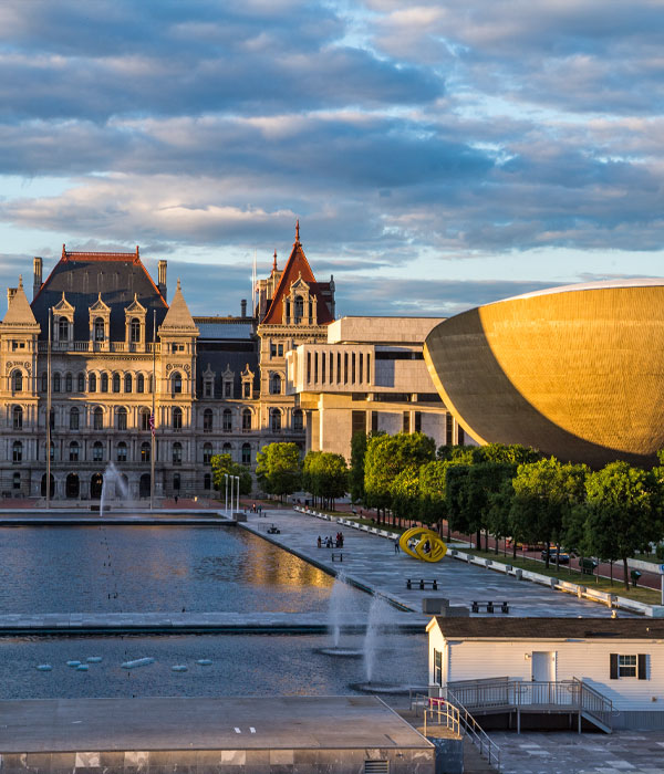 Empire State Plaza reflecting pool with The Egg on the right and the NYS Capital Building in the back