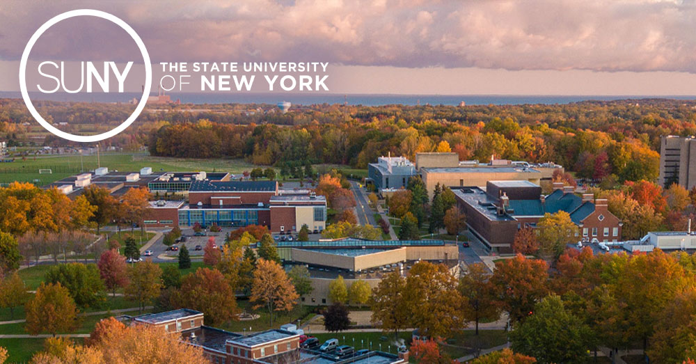 Aerial photo taken by a drone above the SUNY Fredonia campus at twilight with SUNY logo over top.