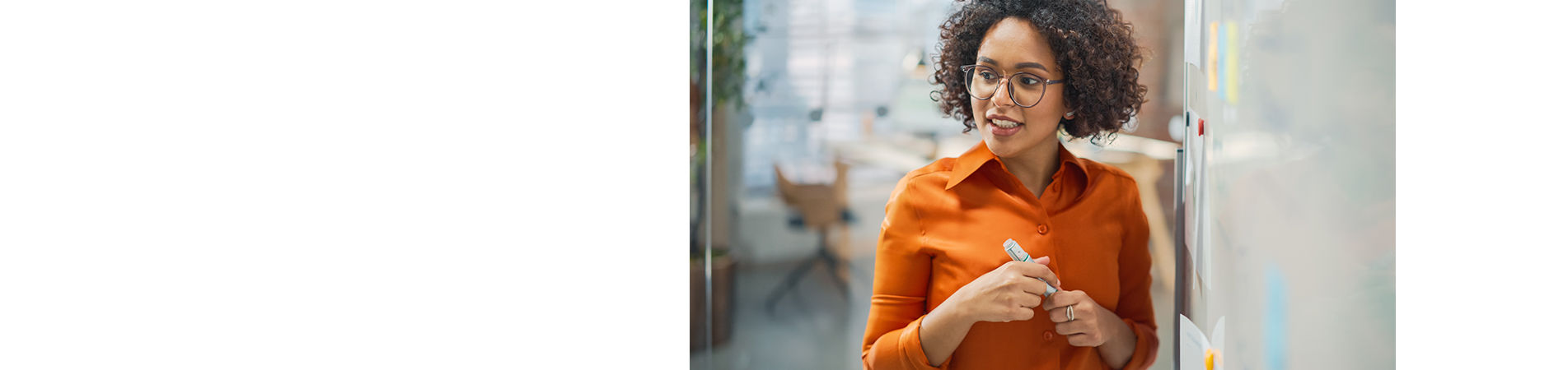 woman in front of white board