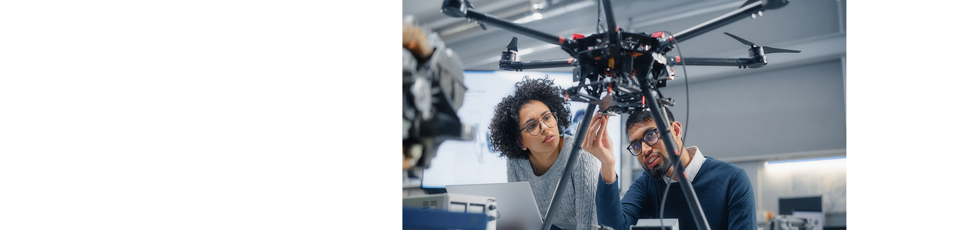 male & female inspect drone