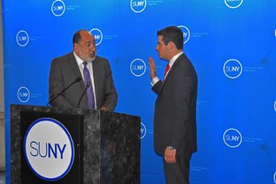 New SUNY Student Assembly president Marc Cohen is officially sworn in by Counsel Joe Porter at his swearing in ceremony.