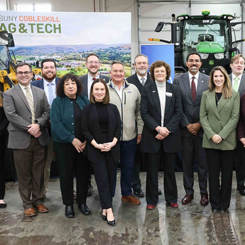 SUNY Chancellor John B King Jr with members of the SUNY Cobleskill commununity inside the new SUNY Agritech Center at SUNY Cobleskill.