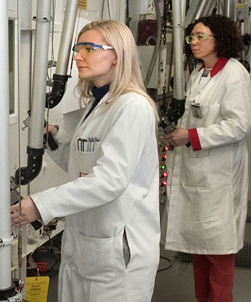 Scientists using hot cells to handle radioisotopes