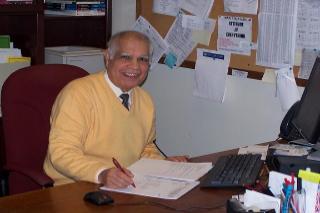 Former RSC Executive Director Ram Chugh working on documents
