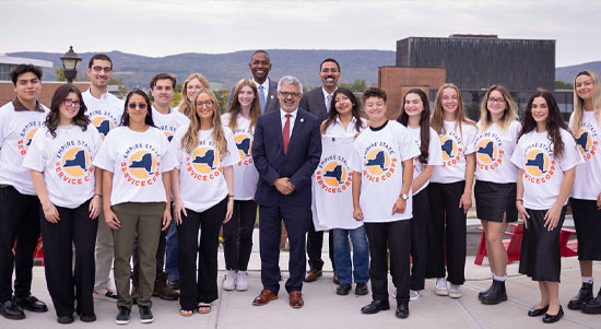 SUNY students in the Empire State Service Corps pose for a picture with Chancellor King and Lieutenant Governor Antonio Delgado