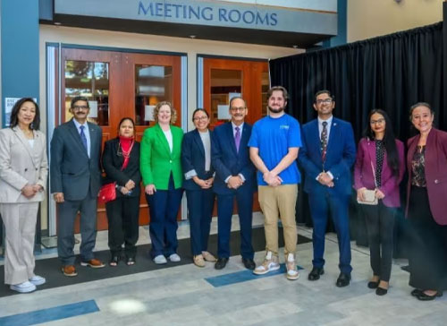 UAlbany ACE representatives stand with president Havidan Rodriguez.