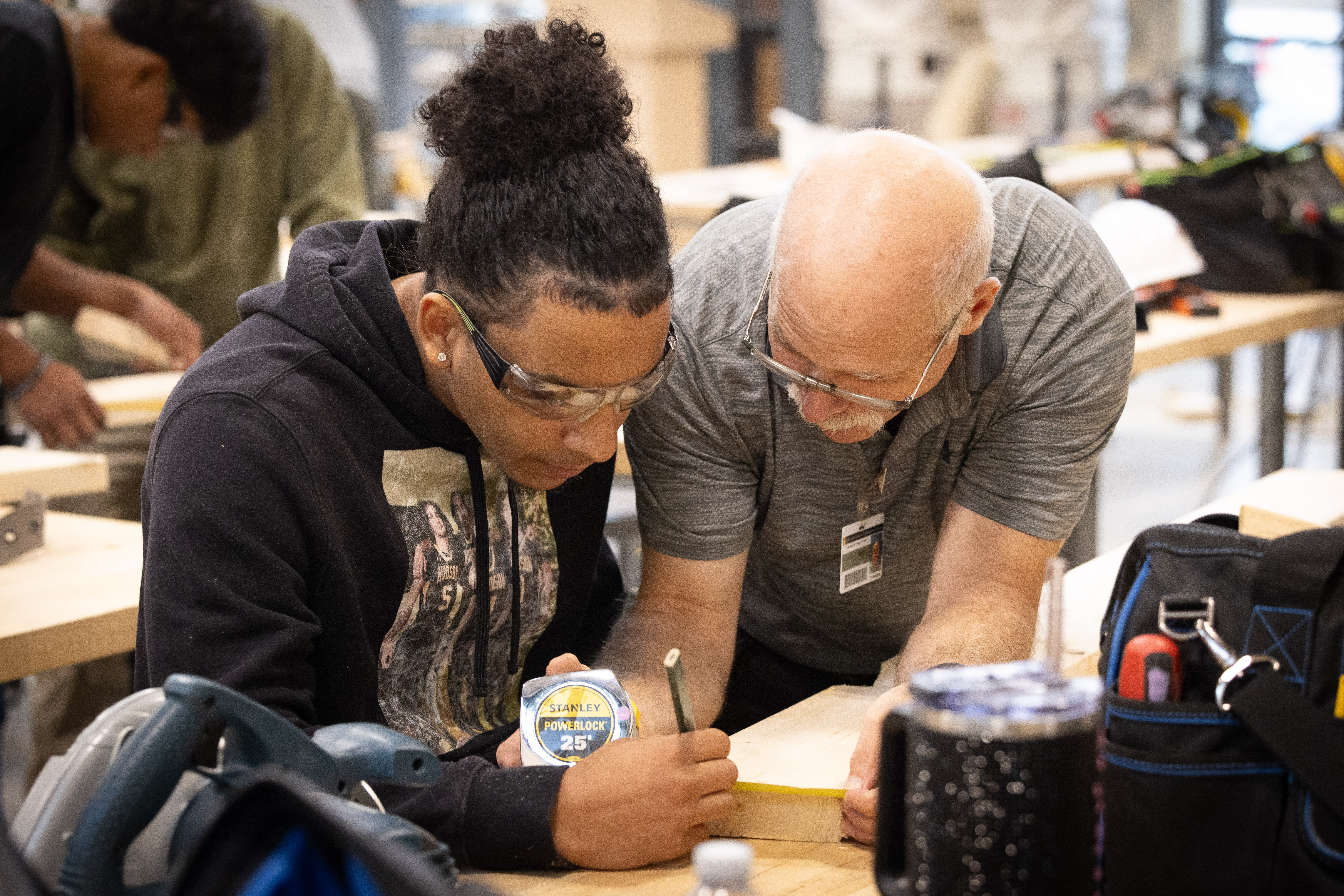 Student and Instructor woodworking